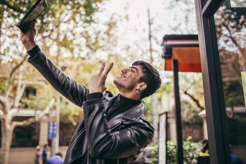 Handsome taking selfie with a digital tablet Handsome taking selfie with a digital tablet