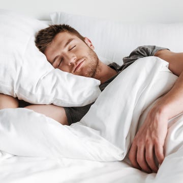 Handsome young man sleeping in bed handsome young man sleeping in bed