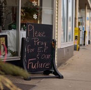 handwritten-sign-is-on-display-outside-a-flower-shop-news-photo-1676488763.jpg?crop=0.670xw:1.00xh;0.104xw,0&resize=180:*