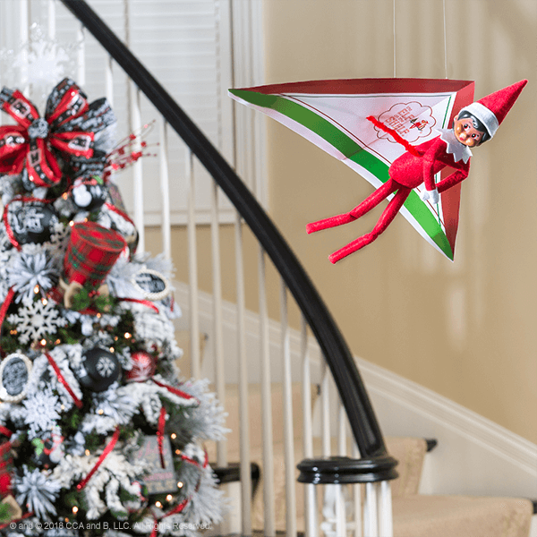 elf on the shelf return ideas hang glider
