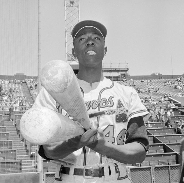 original caption milwaukee braves outfielder hank aaron doesn't really pack monstrous bats like these it simply looks that way to the opposition, as aaron sports his 484 batting average along with the giant bats hank and his teammates whipped the san fransisco giants here 4 2, 518