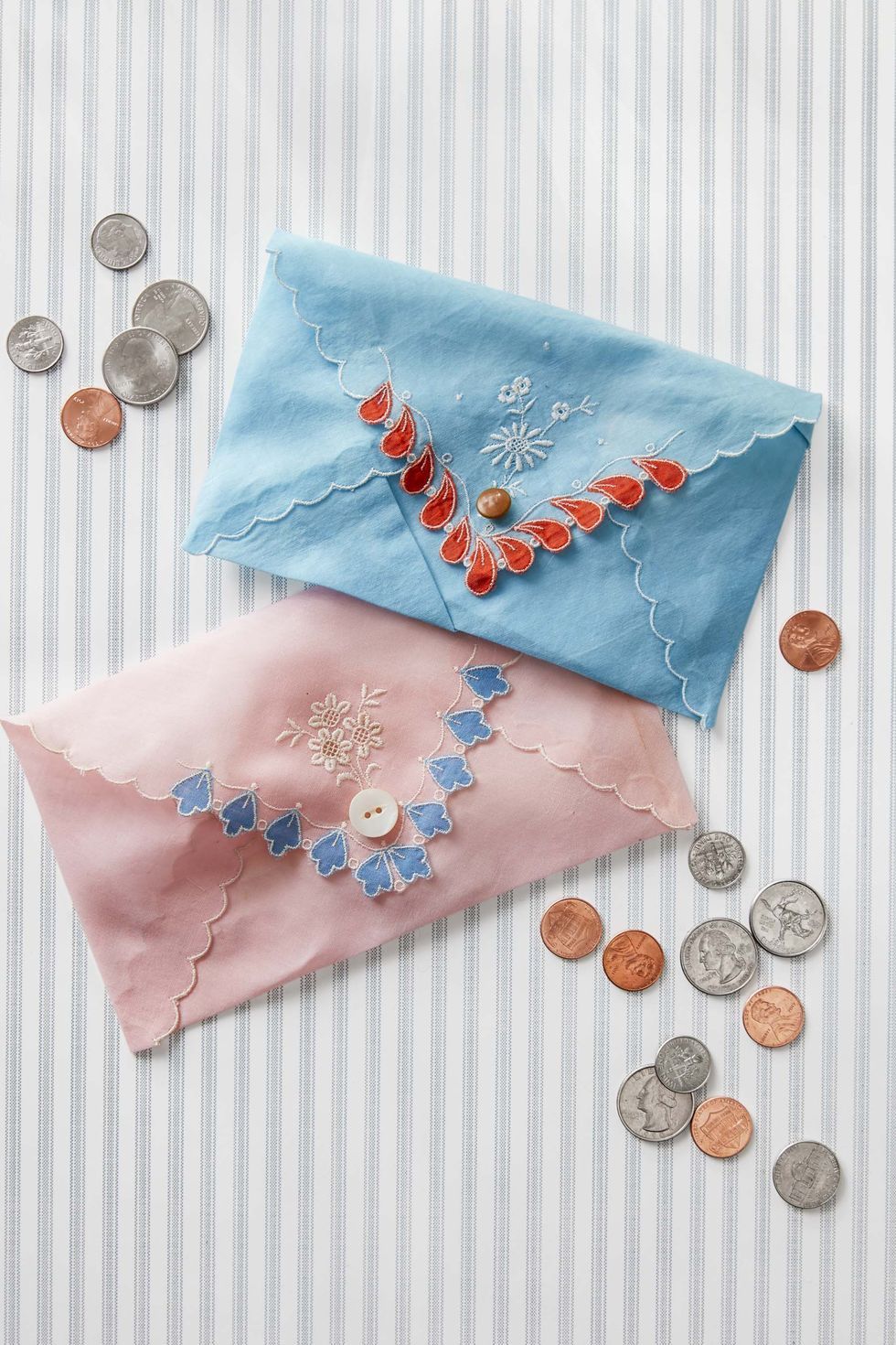 one coin purse in blue and one in pink