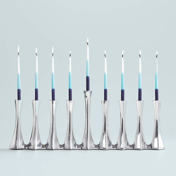 a row of blue and white candles