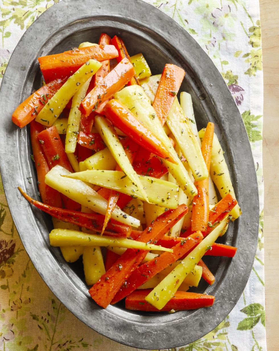 honey glazed carrots and parsnips on metal tray