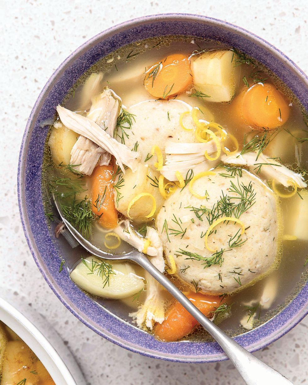 roasted chicken matzo ball soup in blue bowl