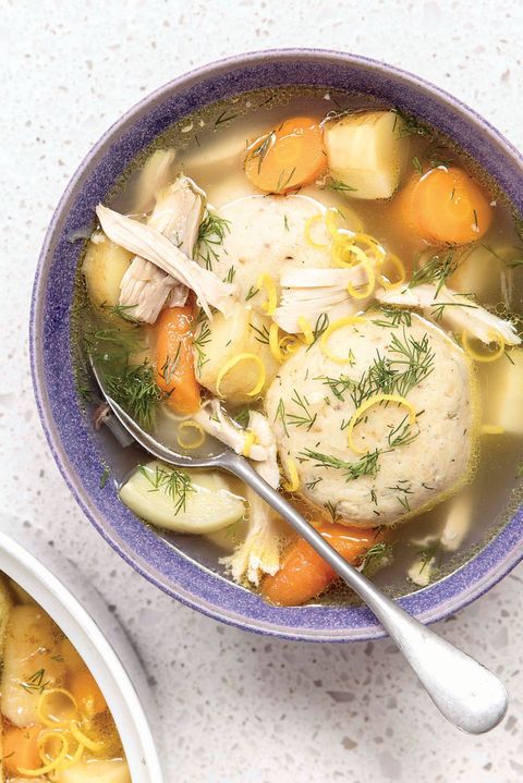 roasted chicken matzo ball soup in blue bowl