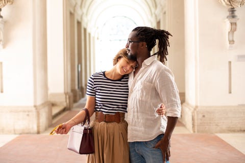 couple in sunlit entrance hall