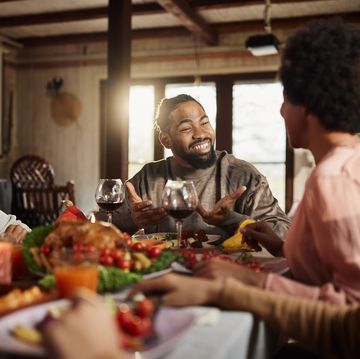 happy african american family enjoying in lunch at dining table