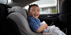 happy  boy inside car