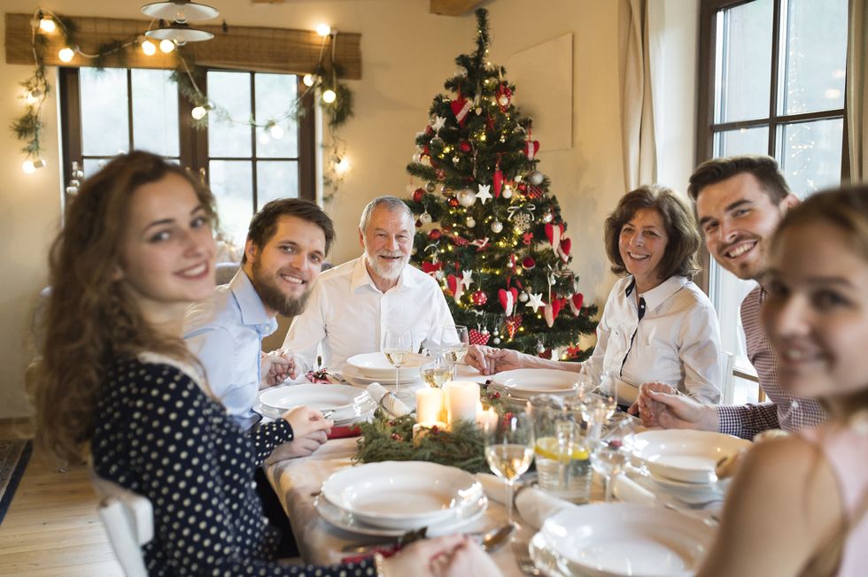 happy family at christmas dinner table