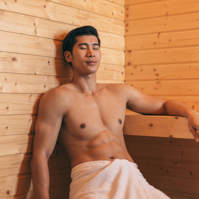 Happy Good Looking And Attractive Young Asian Man With Muscular Body Relaxing In Sauna Hot