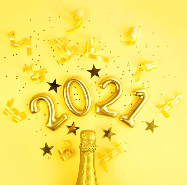 happy new year 2021 celebration with champagne in trendy yellow colour