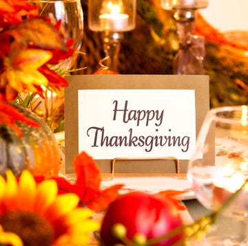 Happy Thanksgiving Wishes and Messages happy thanksgiving place setting autumn flower centerpiece table