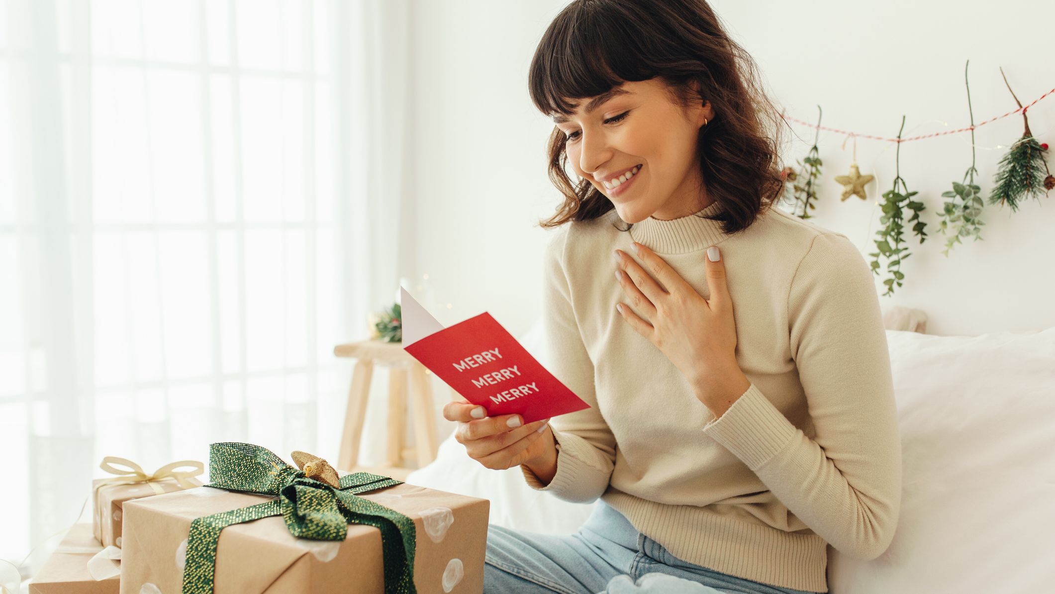 Christmas Happy Smiling Woman With Gift Box And Credit Card Stock