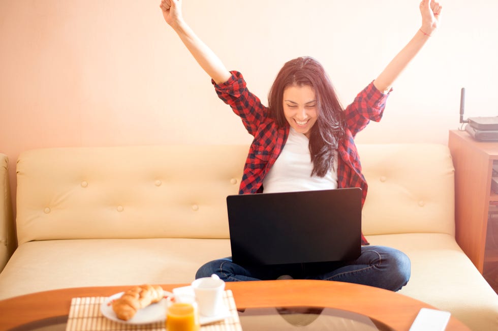 Happy woman with laptop