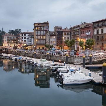 harbor and village of llanes illuminated at night