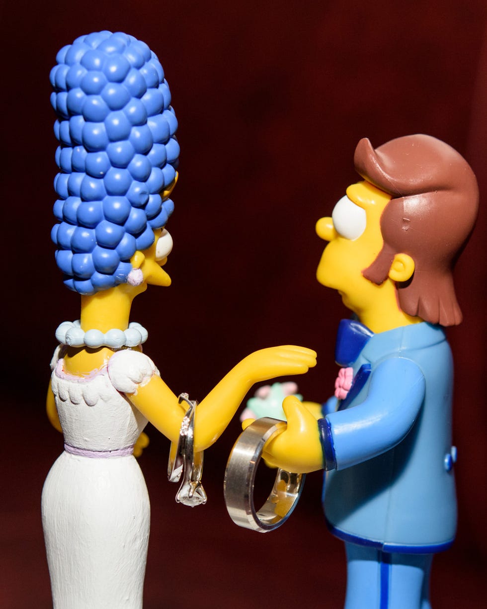 Toy, Action figure, Figurine, Yellow, Animation, Gesture, Muscle, Electric blue, Animated cartoon, Fictional character, 
