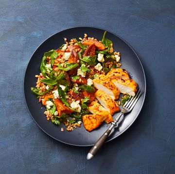 harissa chicken and farro salad on a blue background