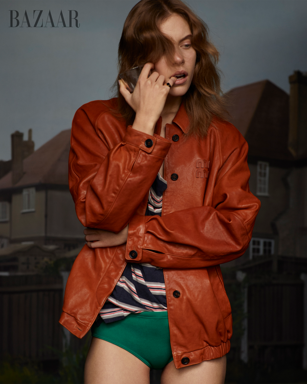 a woman in a red coat
