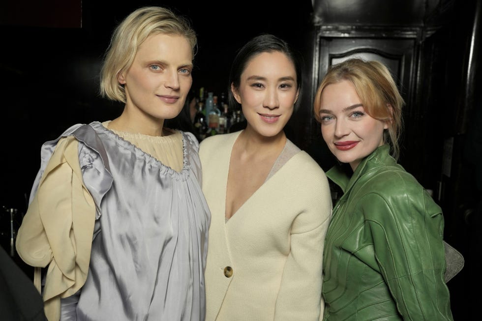 a group of women posing for a photo