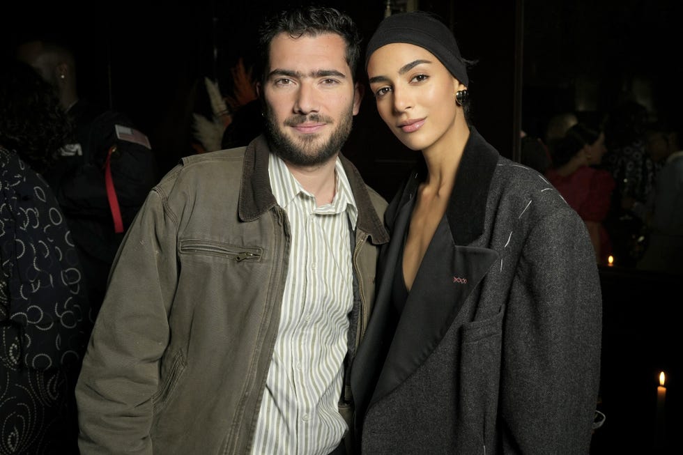 a man and woman posing for a picture