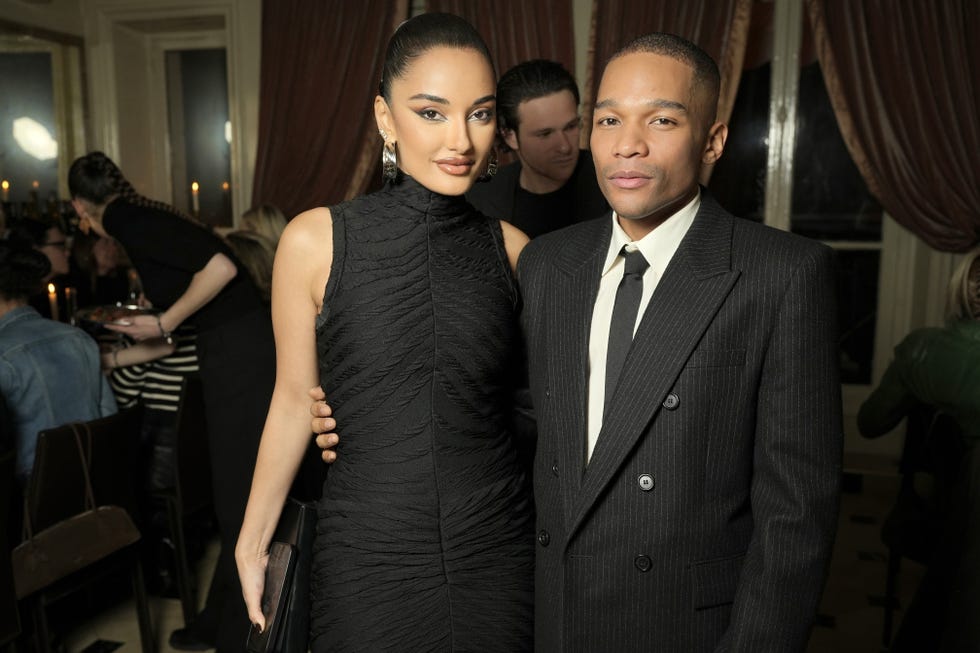 a man and woman posing for a picture
