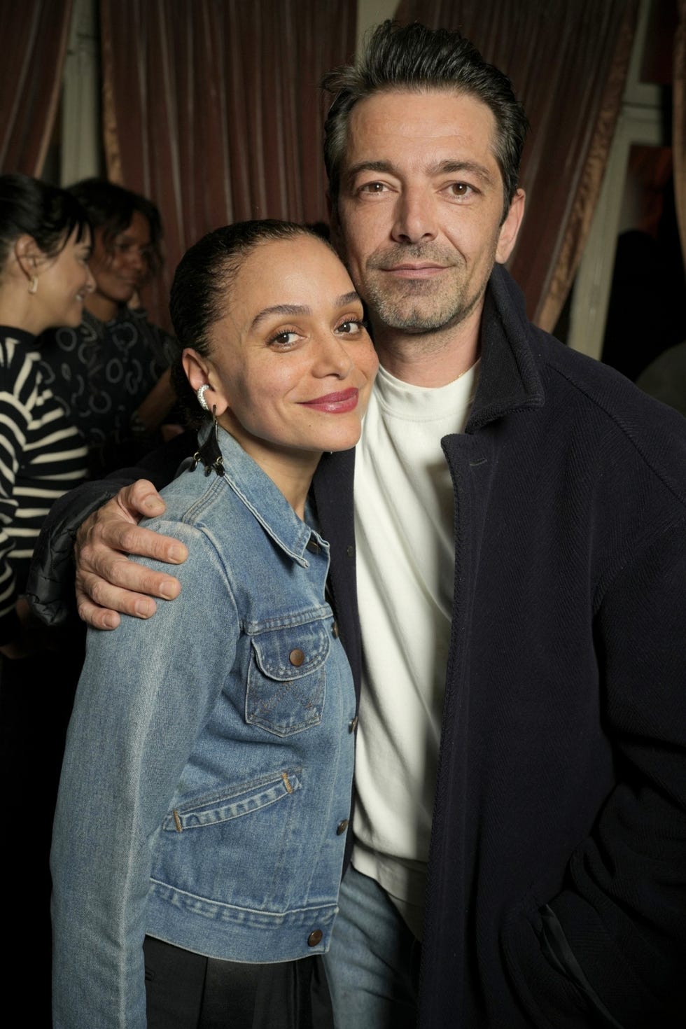a man and woman posing for a picture