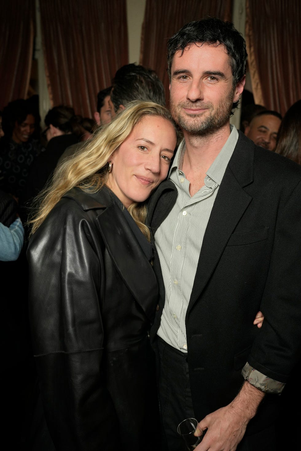 a man and woman posing for a picture