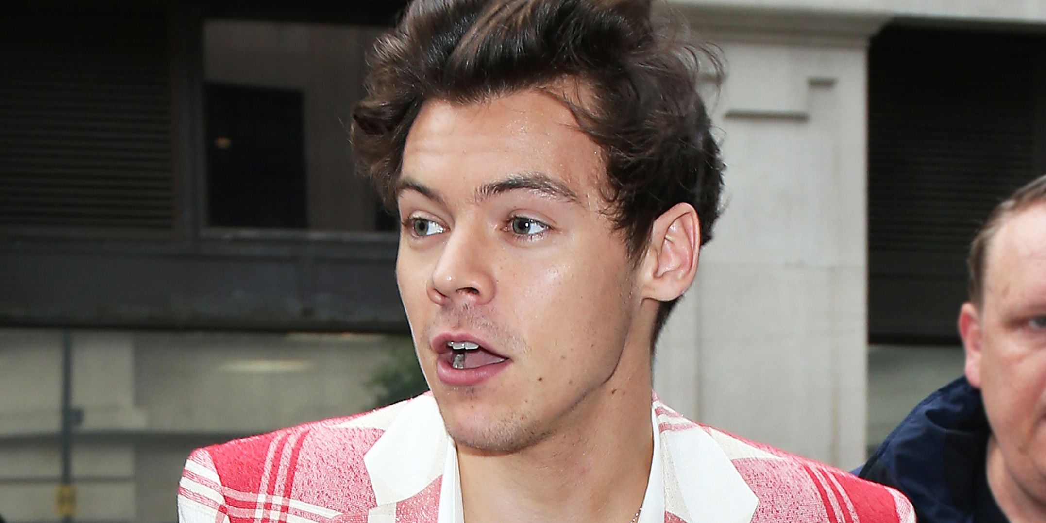 Harry Styles Looks Great In Heels and Red Plaid Suit