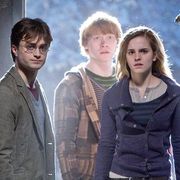 harry, ron and hermione in a still from harry potter and the deathly hallows part 1