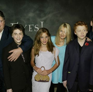 london   november 3 british actors, actress and author l r robbie coltrane, daniel radcliffe, emma watson, jk rowling, rupert grint and kenneth branagh attend the uk film premiere of harry potter and the chamber of secrets at the leicester square odeon cinema on november 3, 2002 in london photo by dave hogangetty images