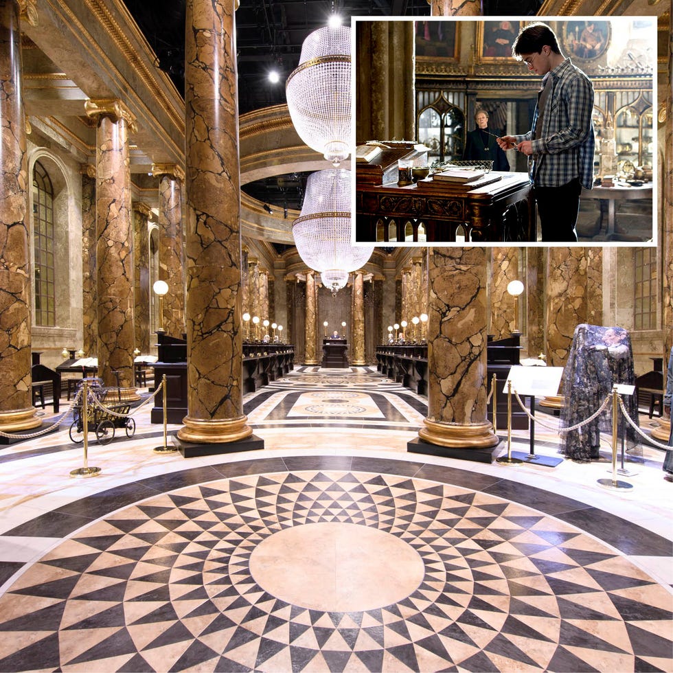 interior of an elegant hall with ornate columns and intricate flooring design