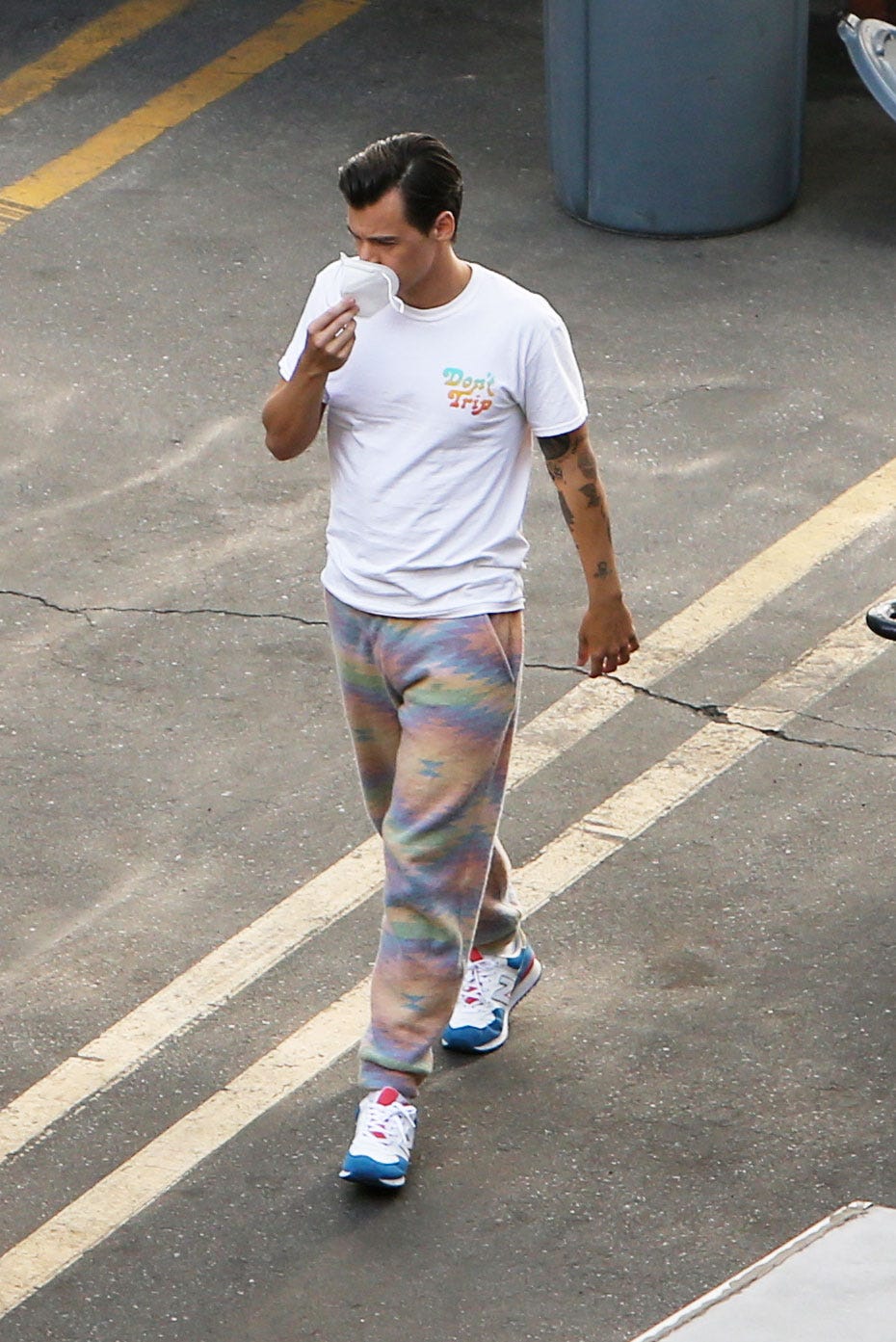 Harry Styles Debuts a New Retro Haircut and Tie-Dyed Sweats