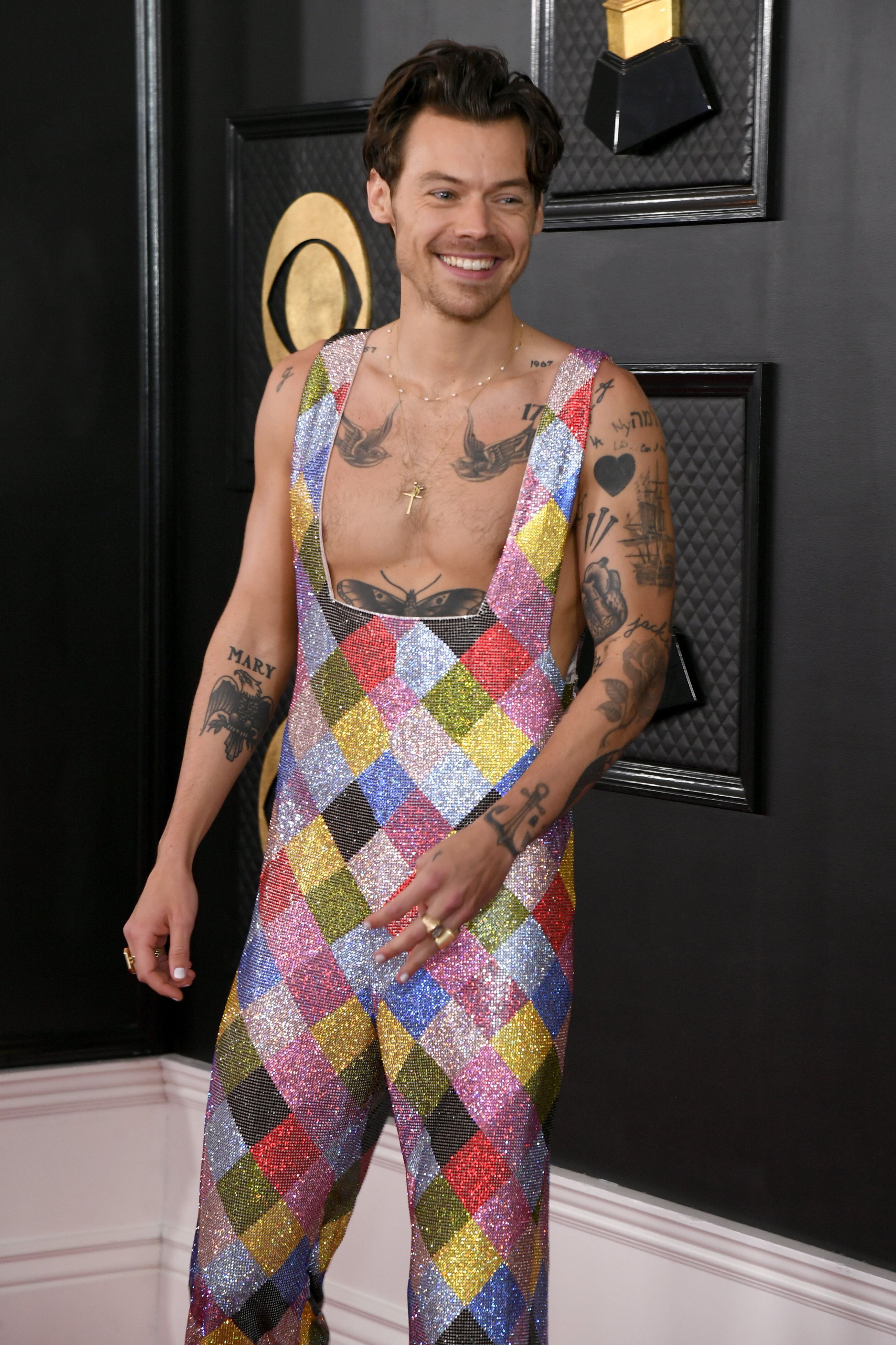 Harry Styles sparks comparisons to The Rainbow Fish in colourful jumpsuit  at 2023 Grammys