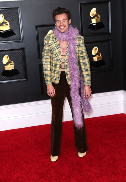 musical talent pose on the red carpet at the 63rd annual grammy awards show in downtown los angeles