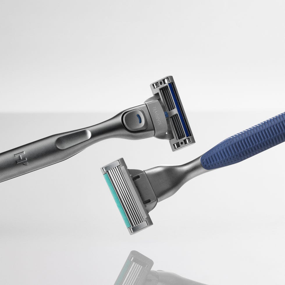 two razors designed for shaving showcasing different handle designs and blade configurations