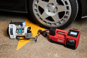 portable tire inflators positioned beside a car tire