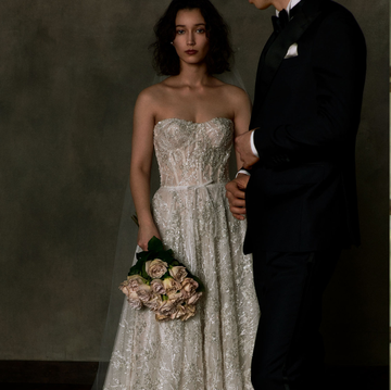 a woman in a wedding dress and a man in a suit