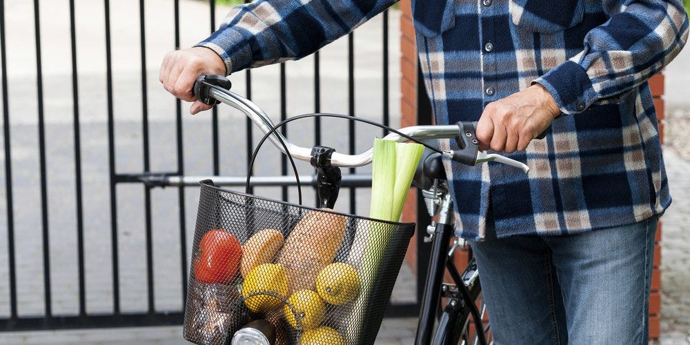 A filled bicycle basket. 