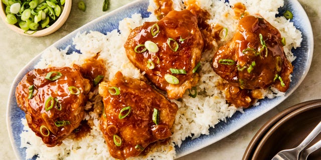 hawaiian shoyu chicken topped with sliced scallions