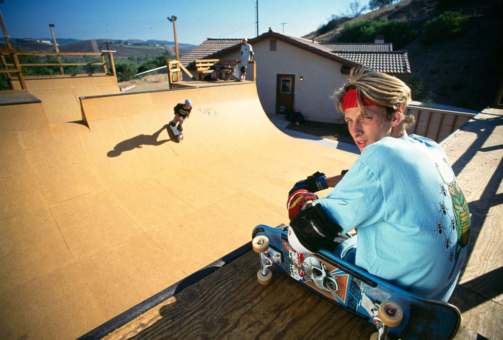 carlsbad, ca   march 3 tony hawk 18 years old  sits on one of his skateboard ramps in his back yard which he built for his friends and himself in 1986 he was making in excess of $ 100,000 a year from skateboarding in 2001 hawk made in excess of $6 million us dollars from royalties on sales of a computer game and other merchandise sold with his name airborne on a skateboard march 3, 1986, carlsbad, california   photo by paul harrisgetty images