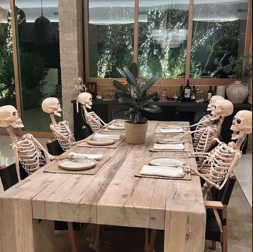 a woman sitting at a table a woman sitting at a table