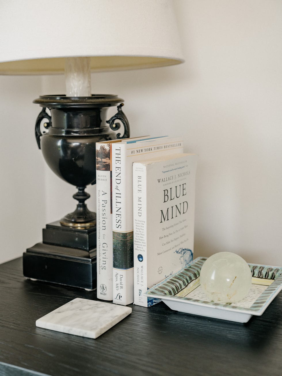 books and a table lamp