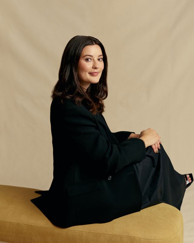 victoria prew, founder of hurr, sitting on a yellow seat