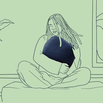woman holding a pillow