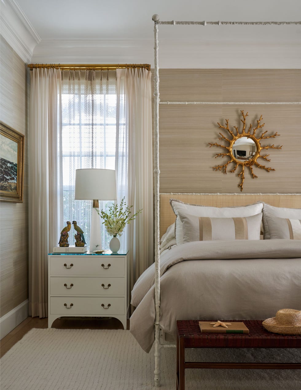 a bedroom with a bed and a lamp