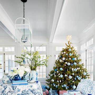 blue and white holiday decor with christmas tree