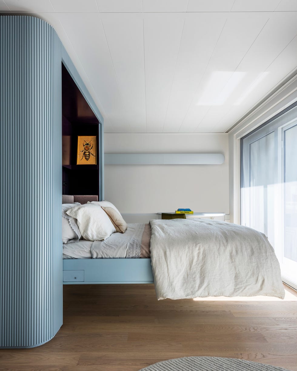 for the living room aboard a yacht, mkca cofounder michael chen added a custom murphy in striking powder blue