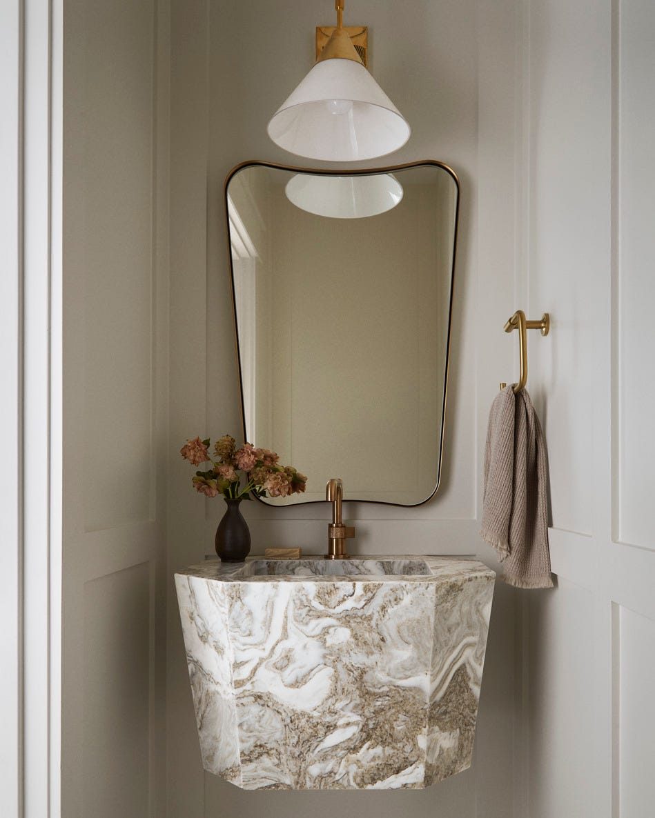 tiny powder room in new jersey home designed by brittany wurzak