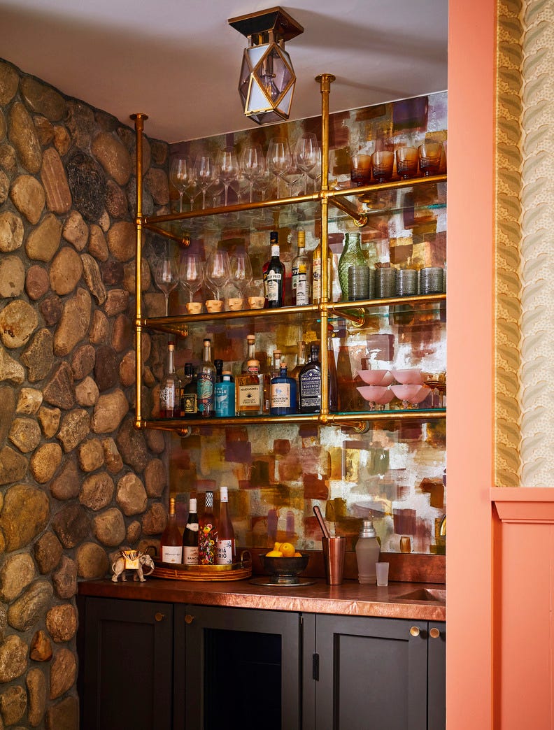 adirondack style cottage home in coecles harbor on shelter island designed by serena dugan. home bar.